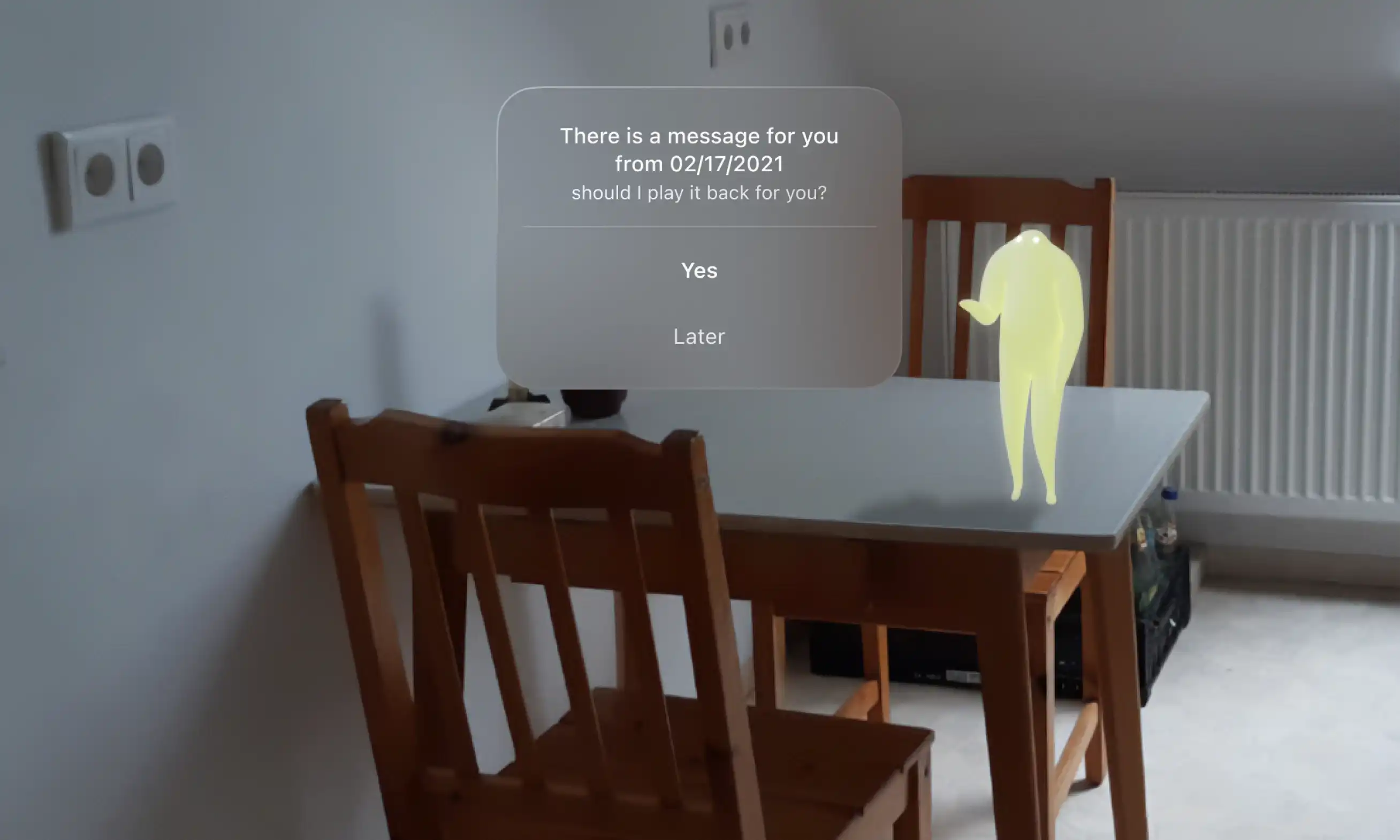 A table with a chair and a white chair in front of it, with an AR character standing on the table.